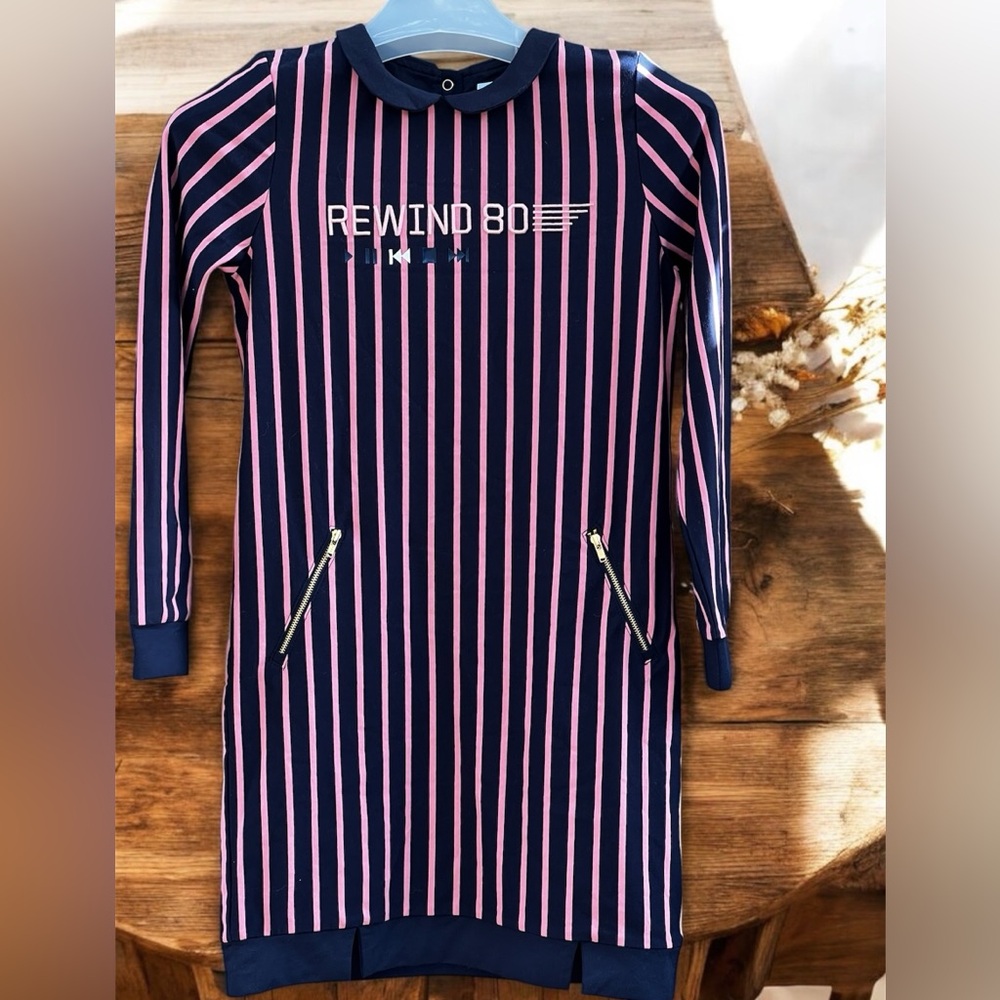Polarn O. Pyret striped long-sleeve dress with a retro "Rewind 80" design.